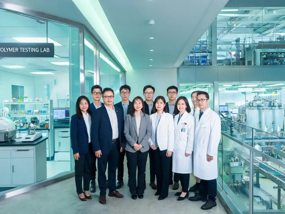 Henkel leadership team in chemistry facility